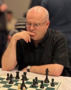 Dave playing Black, contemplating his move.